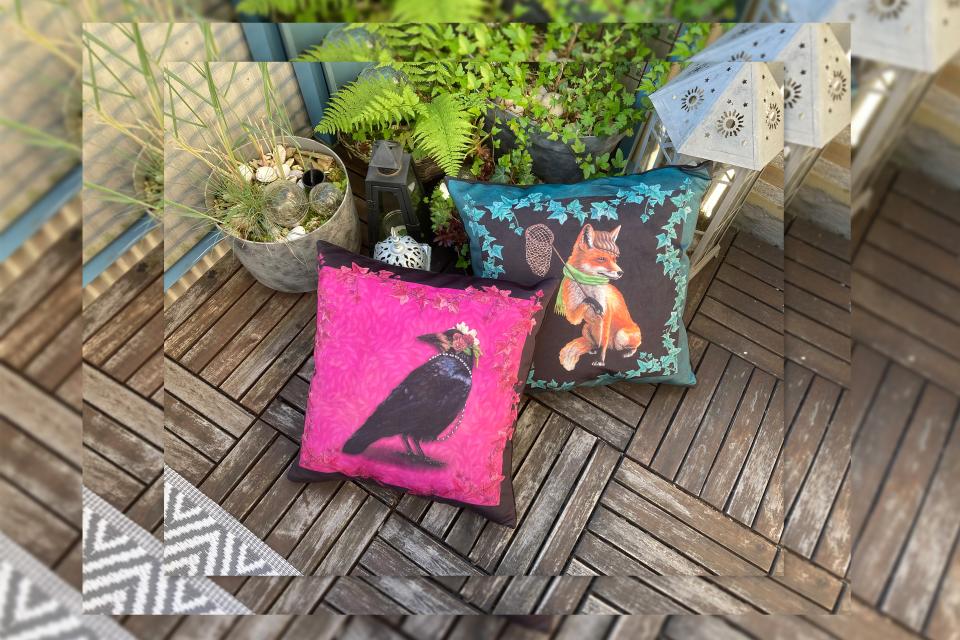 Two pillows with animals painted by Jenny Holmlund